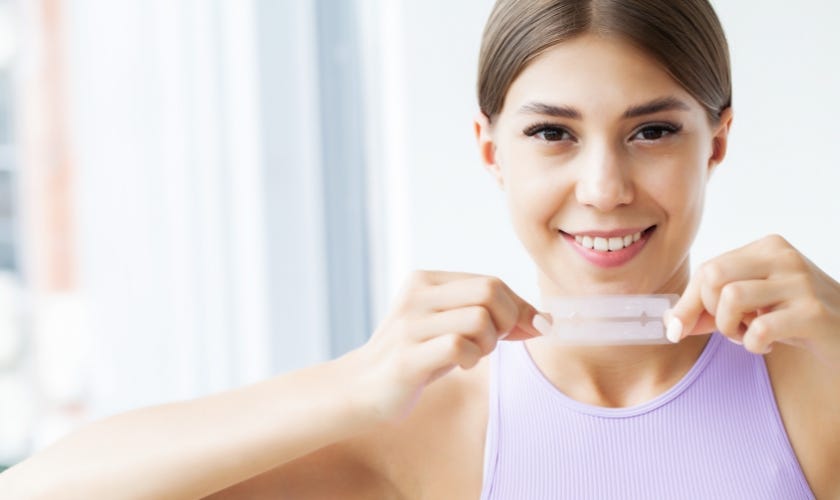 What are the reasons behind brushing your teeth after using whitening strips? North Frisco