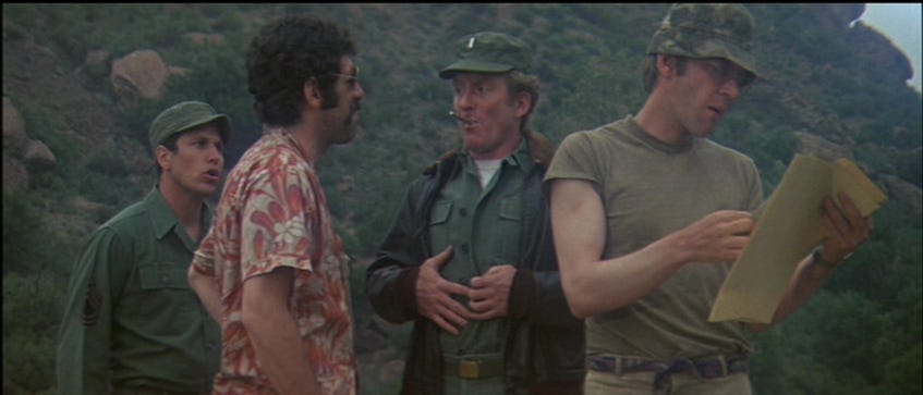 David Arkin, Elliott Gould as Capt. John Francis “Trapper John” McIntyre, Bobby Troup as Sgt. Gorman, & Donald Sutherland as Capt. Benjamin Franklin “Hawkeye” Pierce Jr. in ‘M*A*S*H’ — Credit: 20th Century Fox