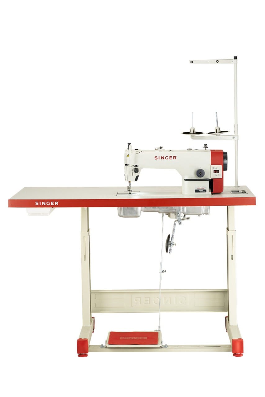 How do I clean and maintain the Singer Merrit Sewing Machine-VS