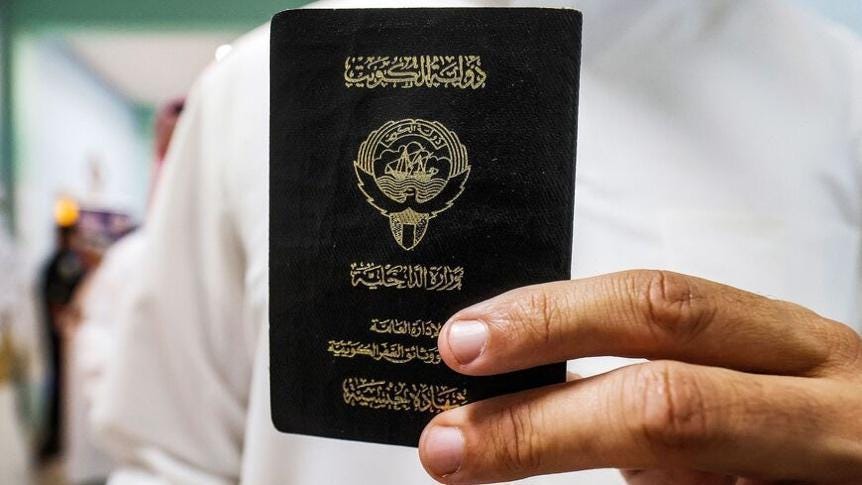Man holding Kuwaiti Pasport (Getty images/ Credit: YASSER AL-ZAYYAT)