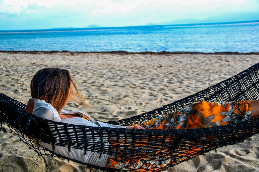 relaxing at the beach (Karma is connected with your success in life)