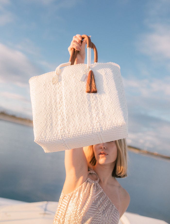 Repurpose designer bags