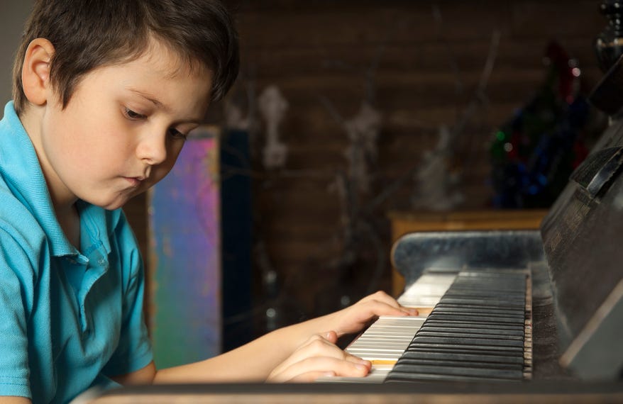 What are the goals for a child’s first piano lesson?