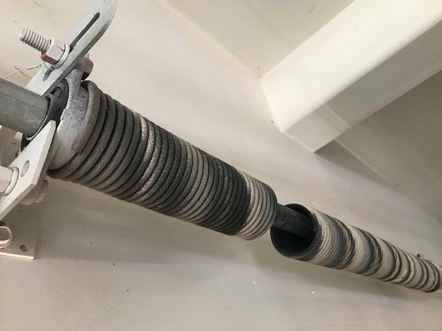 7 Easy Way to Install a Single Torsion Spring on a Garage Door by