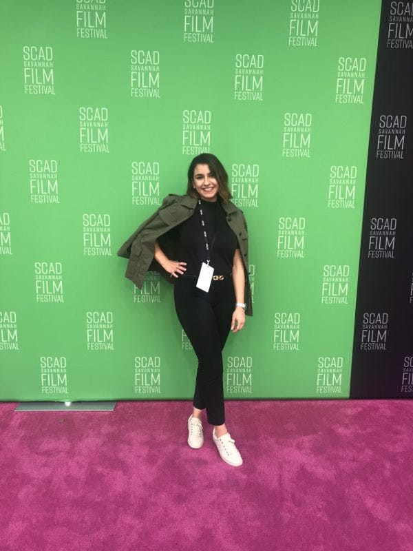 On red carpet at the SCAD Film Festival