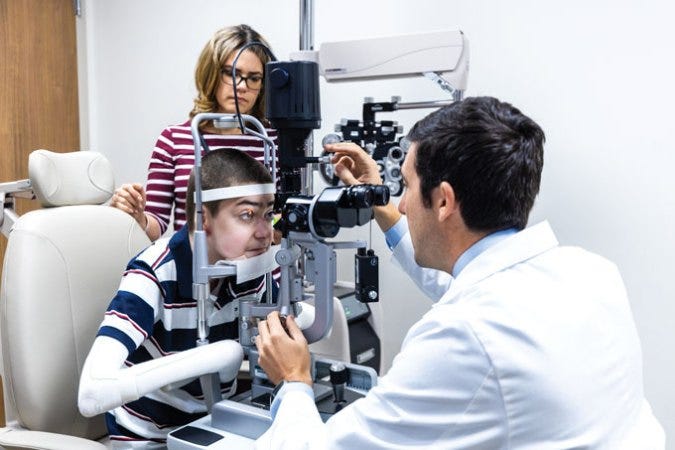 boy visits ophthalmologist