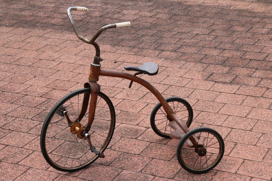 A Child Learning to Ride a Tricycle Made My Day by brian rice Medium