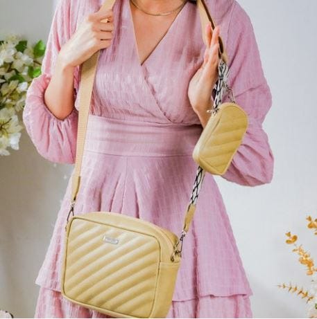 Top 5 Ways to Style Sling Bags. Convenience is one of a sling bag's key… |  by Riya Mehta | Medium