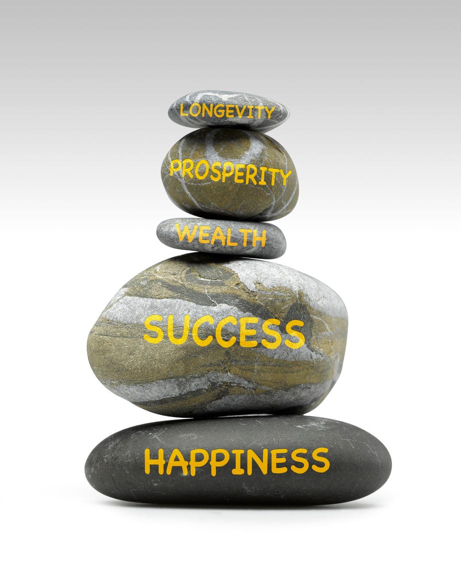 Laptop and book on a desk