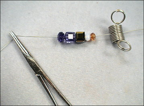 How to use a crimp cover and bead wire clamp