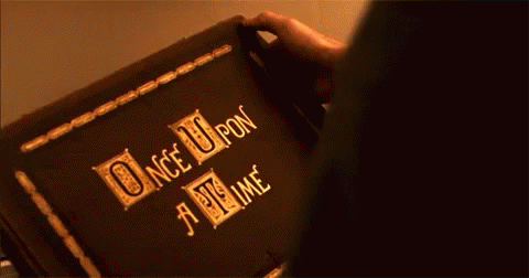 A gif of hands holding a book titled “Once Upon a Time.”