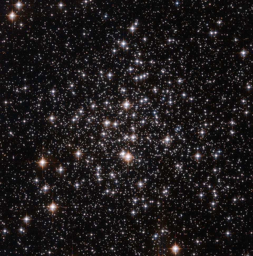 We’re only capable of identifying individual stars within the nearest globular clusters, such as Messier 71, shown here as imaged by the Hubble Space Telescope, located only ~13,000 light-years away. However, by performing population analyses of the light emitted from the stars inside, we can determine what the age(s) of the multiple bursts of stars inside a globular were, and can tell whether the stars were all formed at once or over multiple “bursts” separated by billions of years. (Credit: ESA/Hubble and NASA)