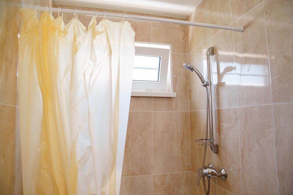 How to Clean a Yellowing Plastic Shower Curtain by