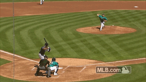 Seattle Mariners' Ty France, left, hits a two-run home run against the San  Diego Padres during the fourth inning of a spring training baseball game,  Friday, March 17, 2023, in Peoria, Ariz. (