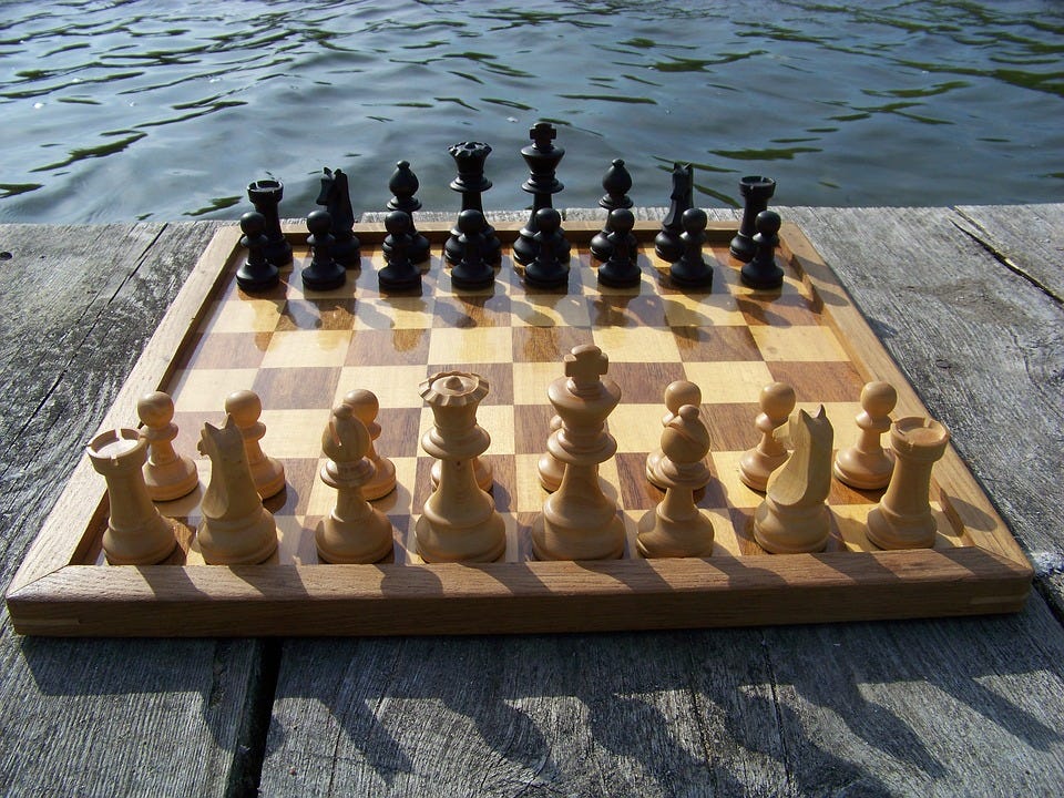 Chess: White is six pieces ahead, but only an obscure route leads to  checkmate in two