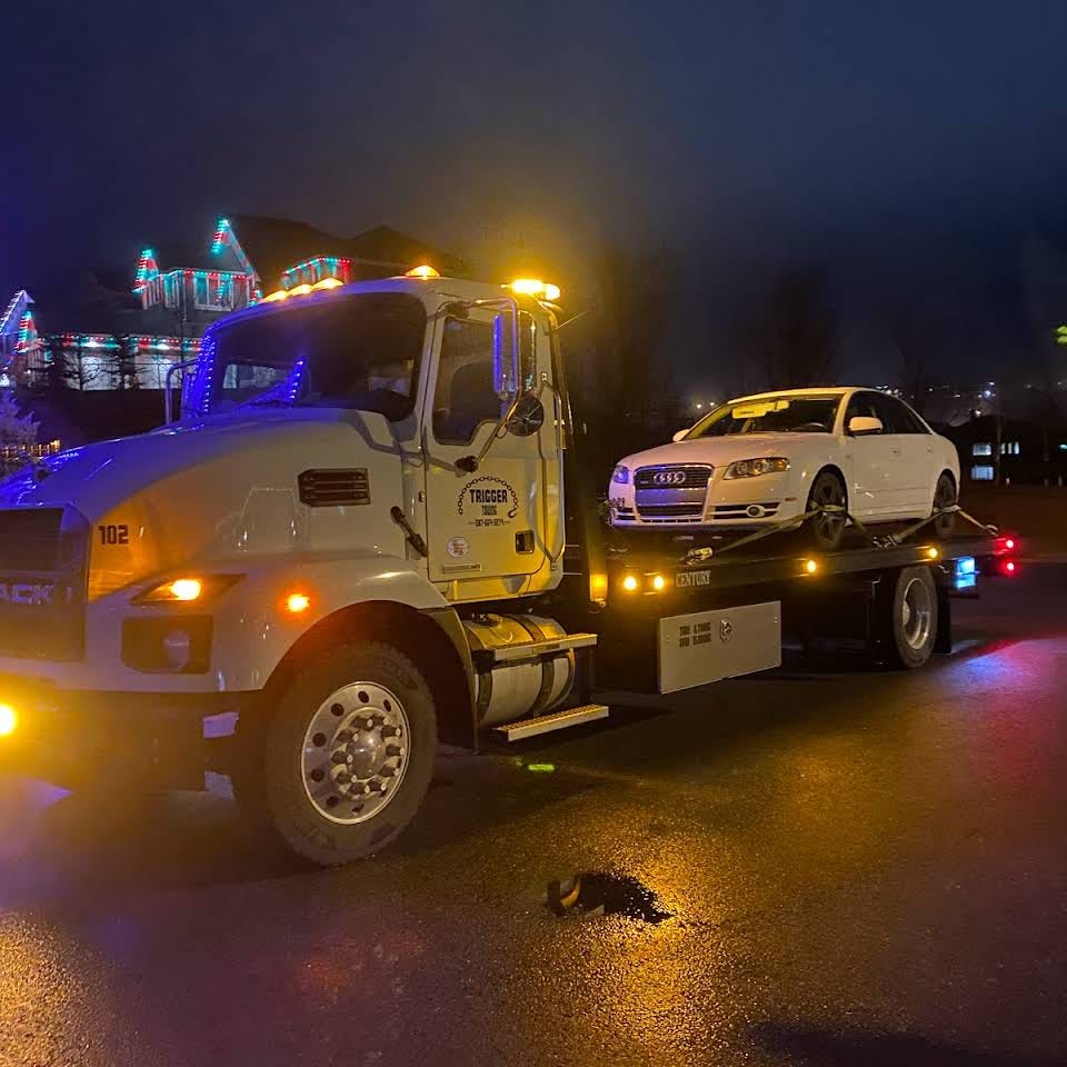 Affordable Flatbed Towing in Calgary, AB. by Trigger Towing and