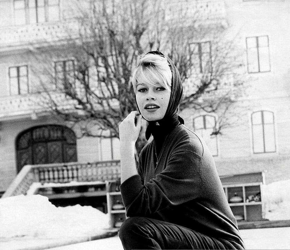 The French actress and model Brigitte Bardot posing on a curling field in Cortina d’Ampezzo, Italy, 1958, via Wikimedia Commons