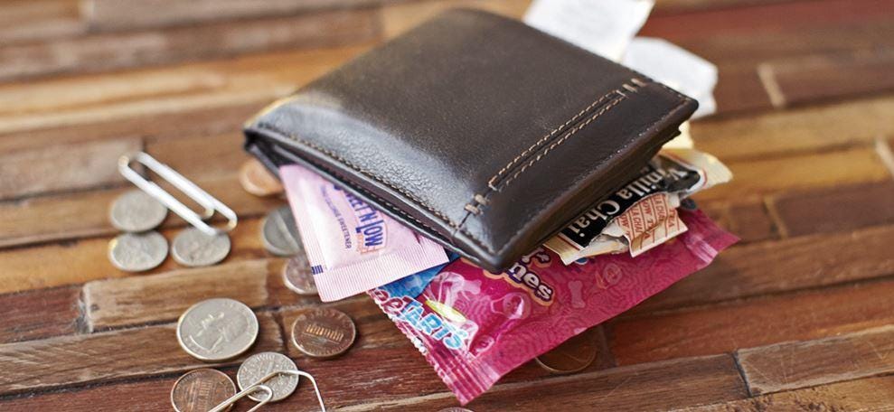 Why do we carry 'fat' wallets?. Ever wondered why you have a fat… | by  Aurochs | Medium